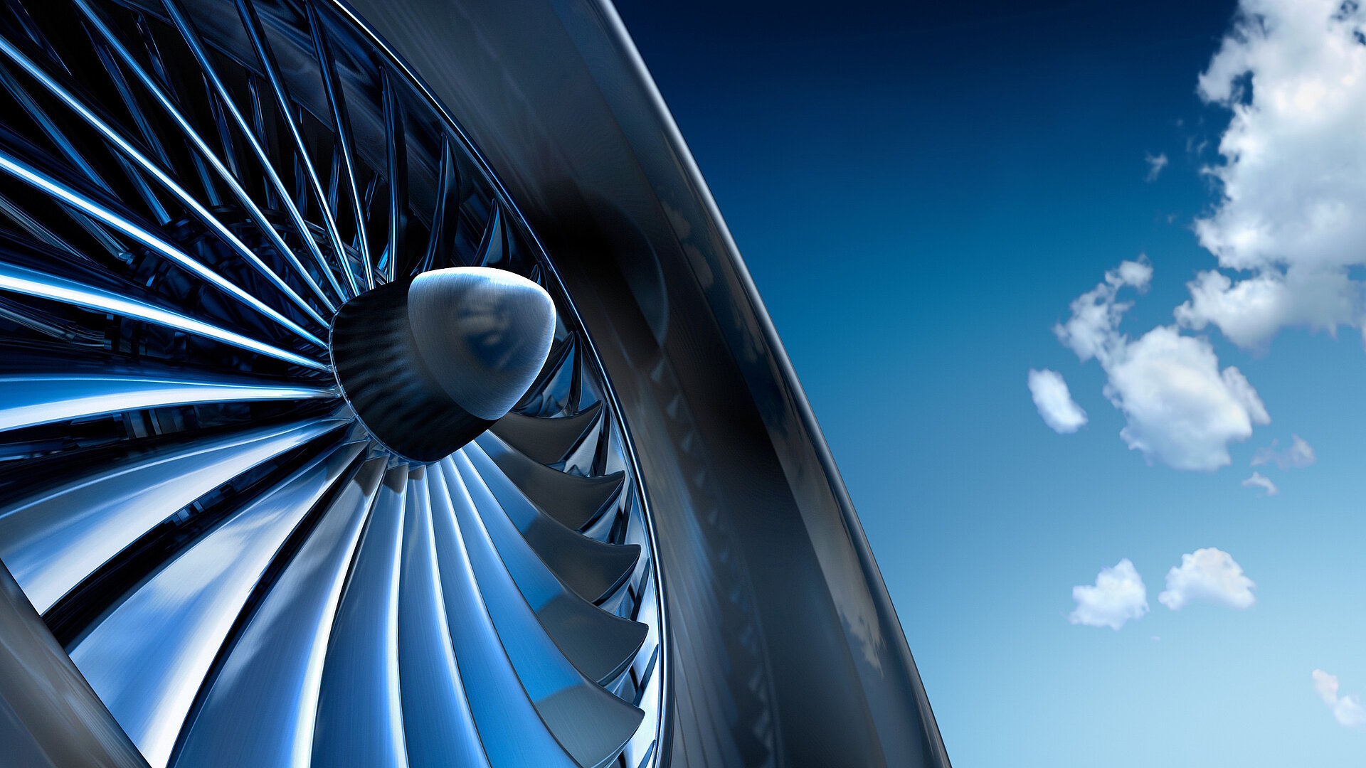 Blue shimmering aircraft turbine against blue sky